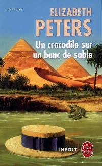 Un crocodile sur un banc de sable