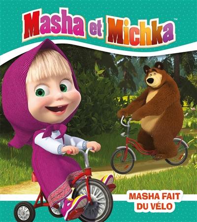 Masha et Michka. Masha fait du vélo