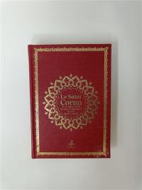 Le saint Coran : et la traduction en langue française du sens de ses versets : couverture bordeaux